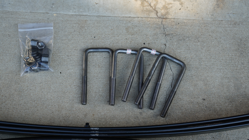 New U-bolts, nuts and lock washers.